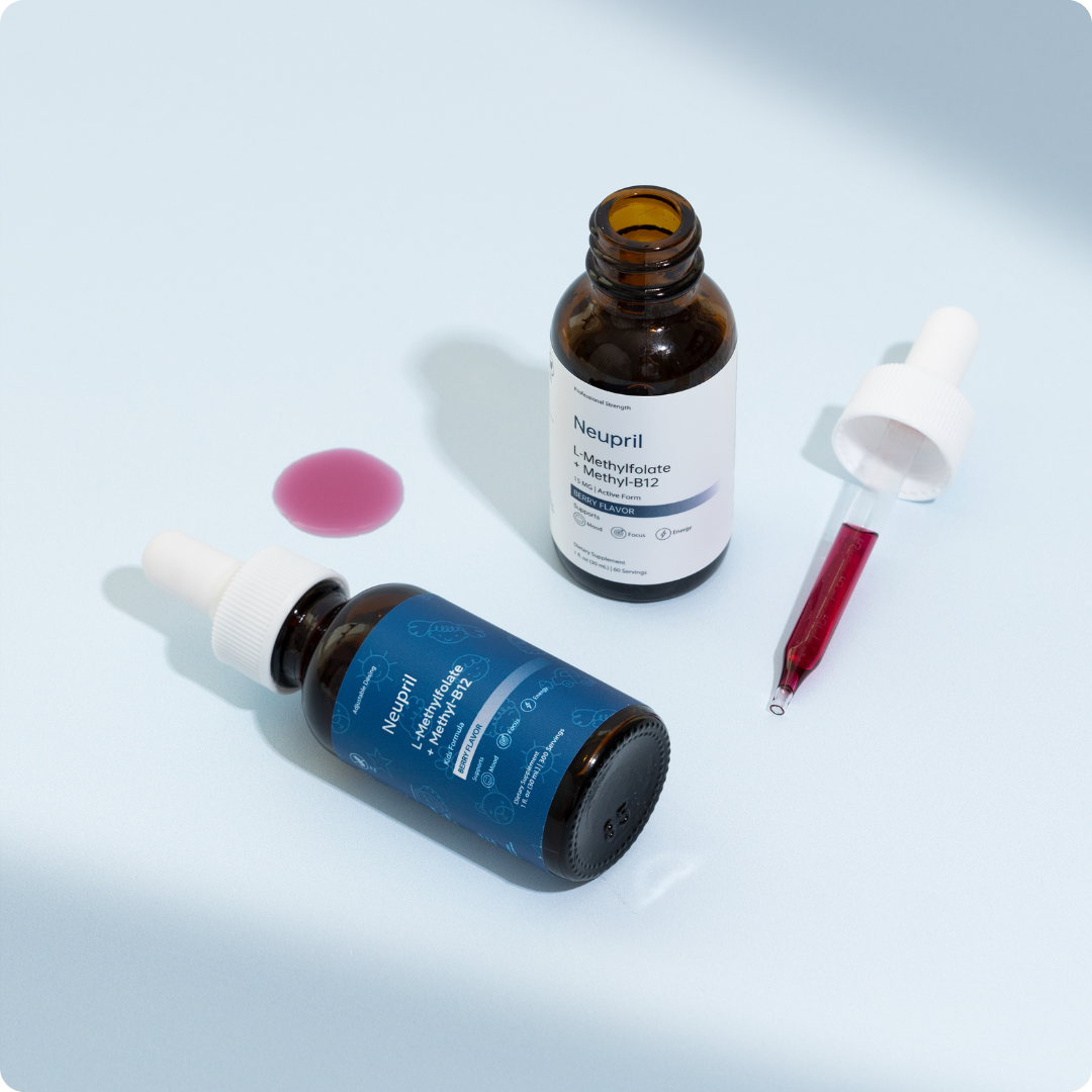 Two bottles of MTHFR supplements, one standing upright and one on its side